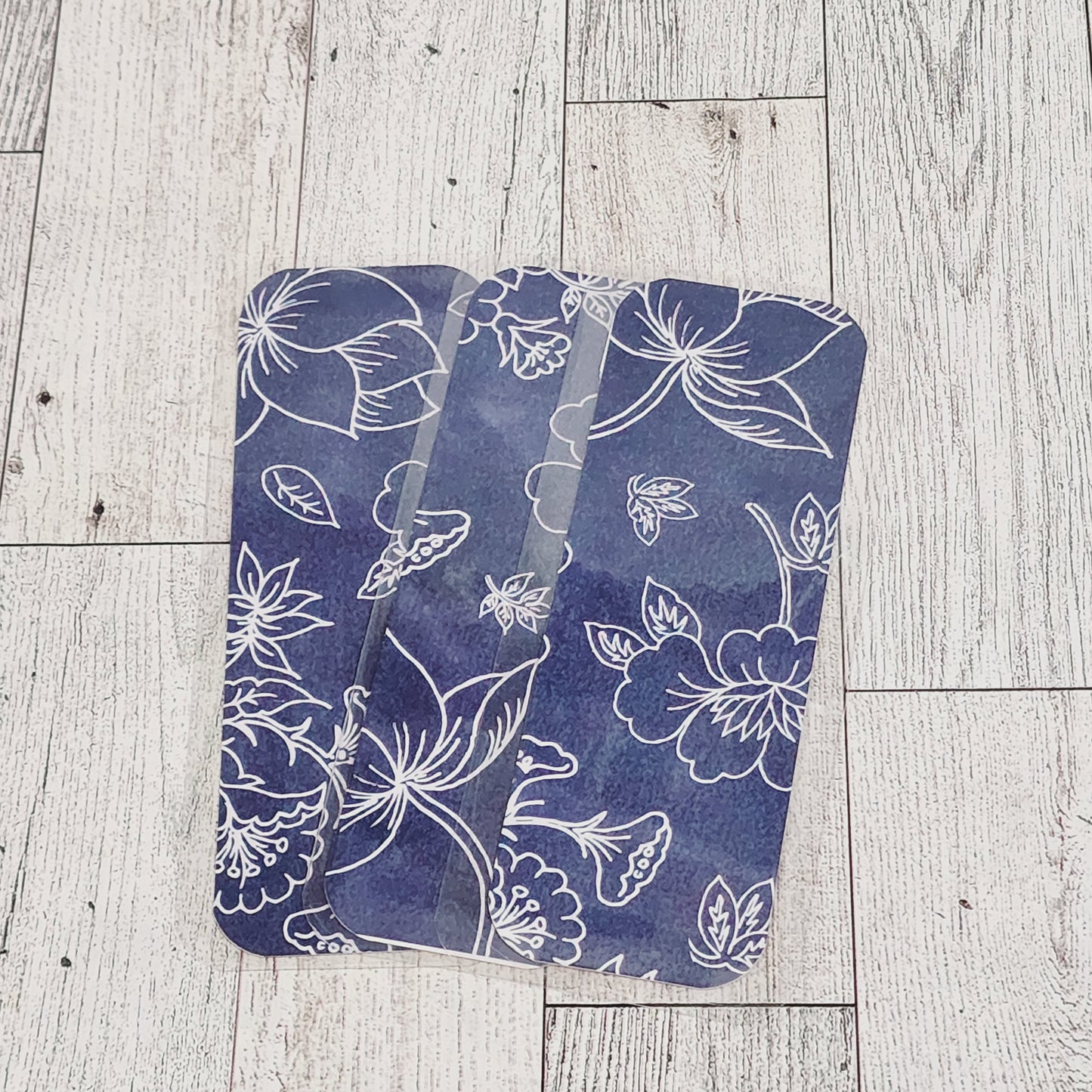 White-lined Flowers Blue Bookmark